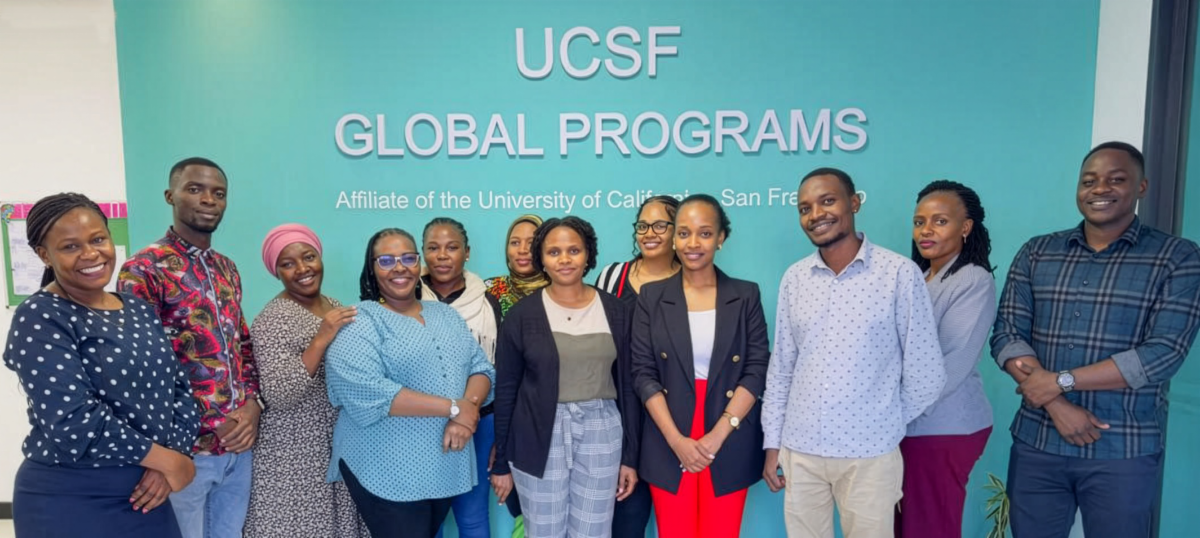 UCSF Tanzania staff in front of the UCSF office