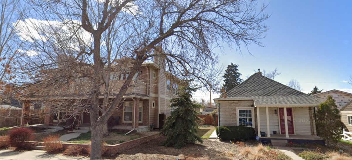 A large duplex has been built next to a single-family home in Denver.