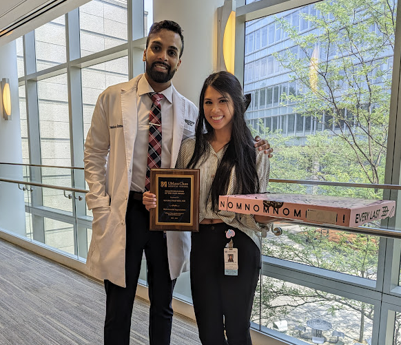 Dr. Suong Nguyen, first-year Pulmonary fellow - recipient of award (right), pictured with her husband Danison Emmerson