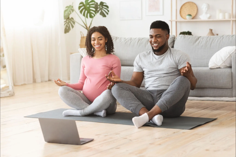 prenatal yoga couple