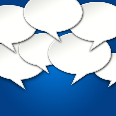 Many overlapping white speech bubbles on bright navy graphic