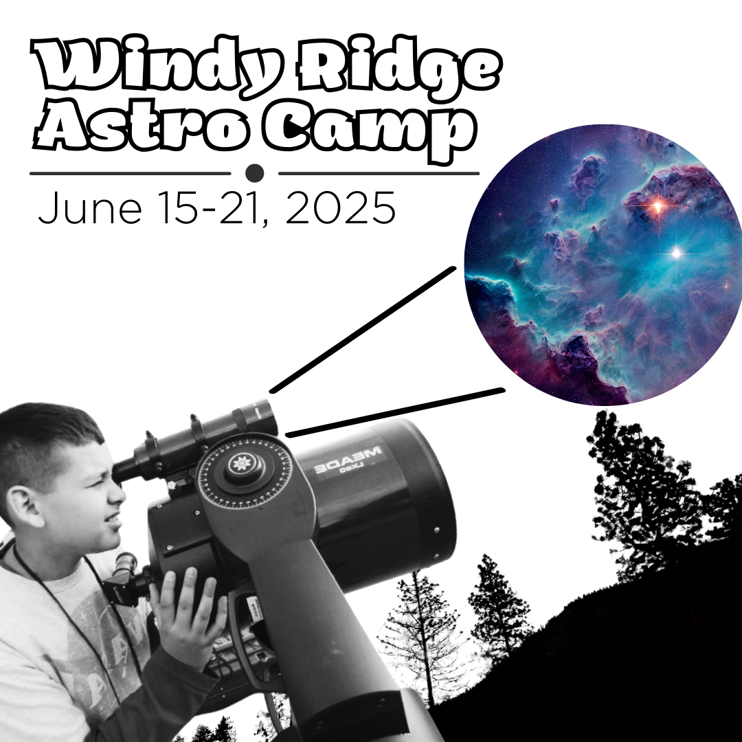 Photo of Student looking through a telescope.