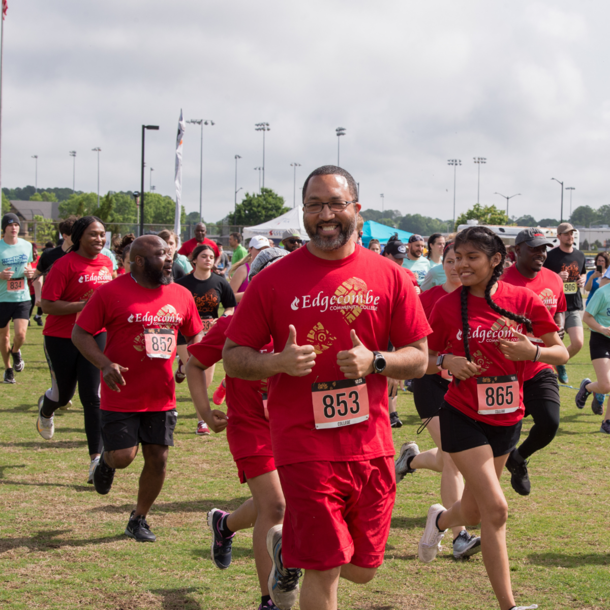 Group of men and women running a 5k