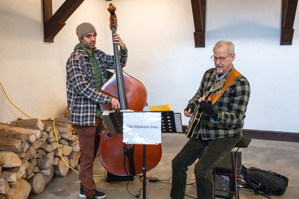 The Einhorn Duo playing Jazz music using a bass and guitar in the Nyack Beach Bathhouse