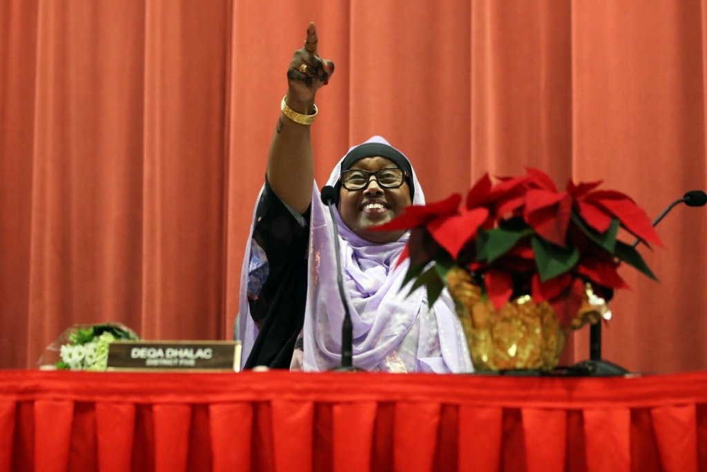 Deqa Dhalac points to members of the audience after she was formally seated as mayor of South Portland, Maine’s fourth largest city, during a ceremony in the Lecture Hall at South Portland High School on Monday. Ben McCanna/Staff Photographer