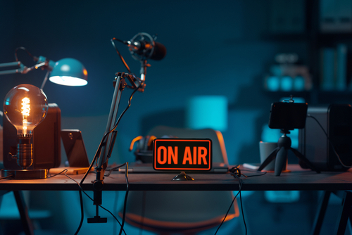 Live online radio studio desk with on air sign_ entertainment and communication concept