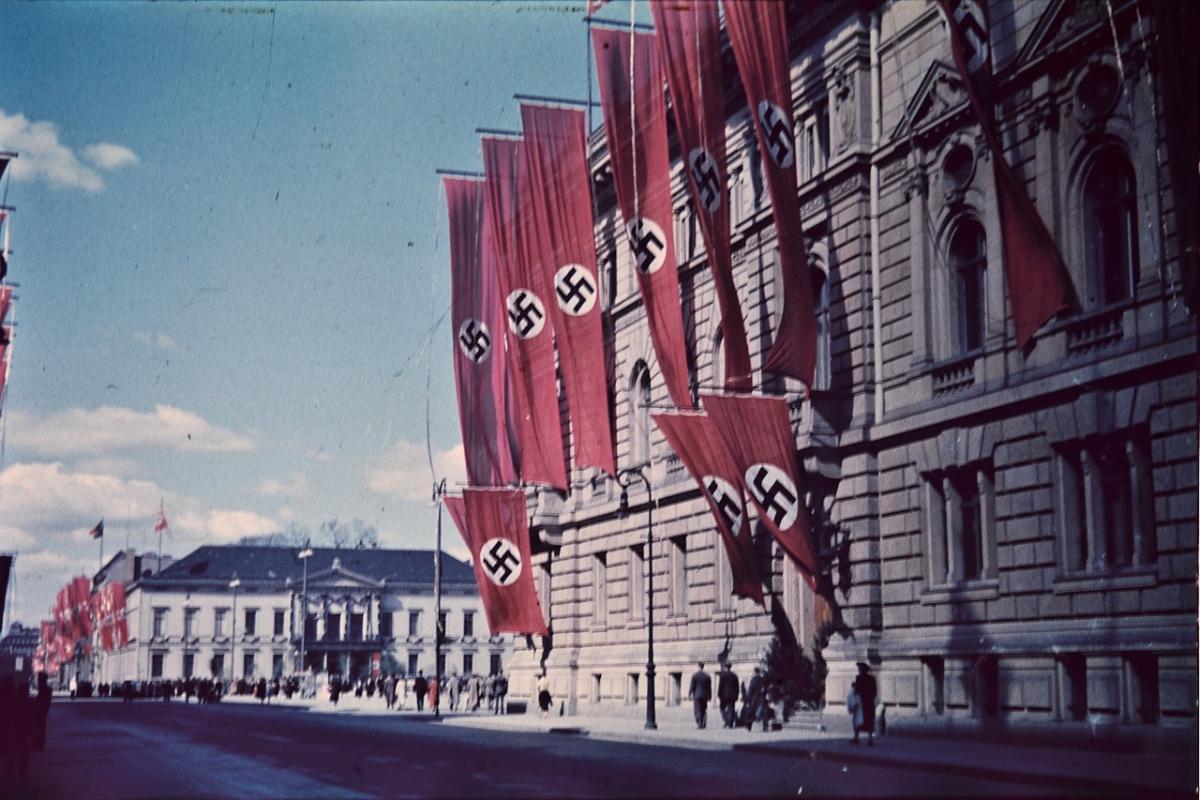 Rows of swastika banners hanging on buildings in Nazi Germany