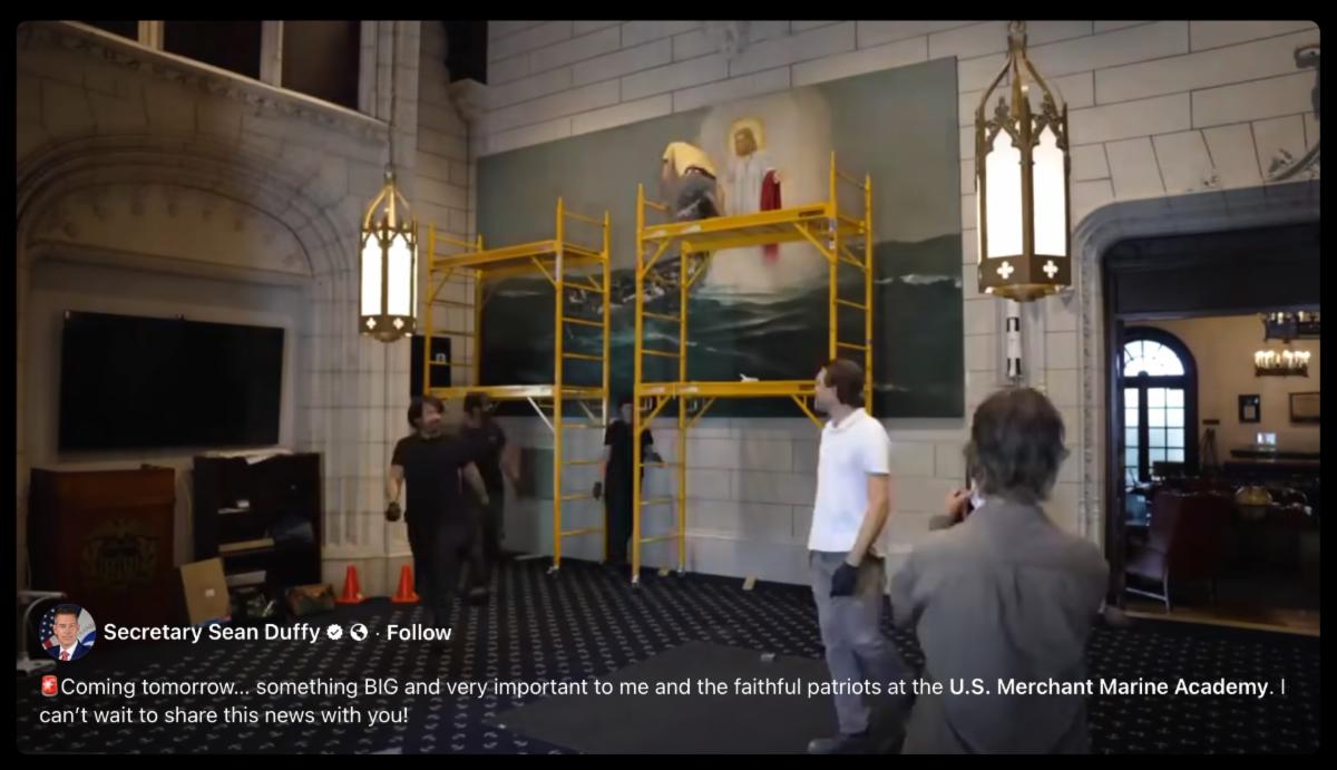 Still image from Duffy's video of giant Jesus painting being rehung
