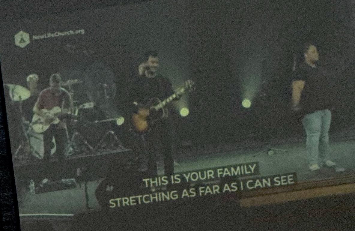 Close up of TV screen playing New Life Church worship service in Air Force Academy dining hall