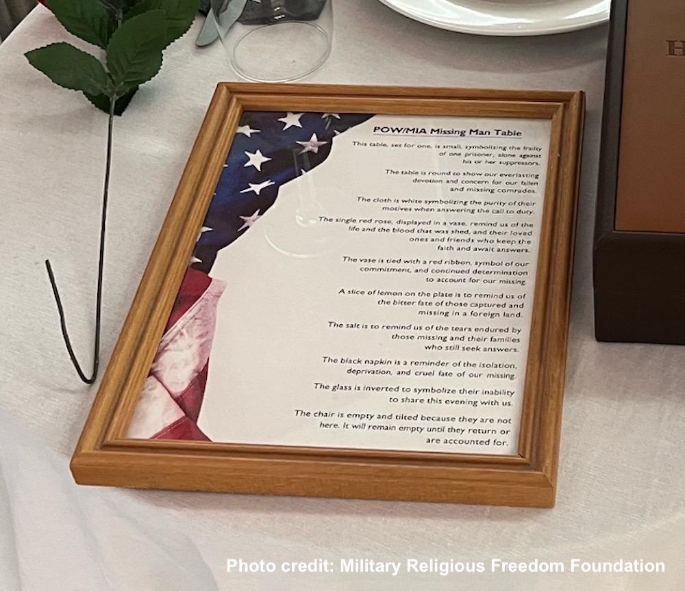 Close up of framed list of the table items and their symbolism showing that a Bible is not on the list
