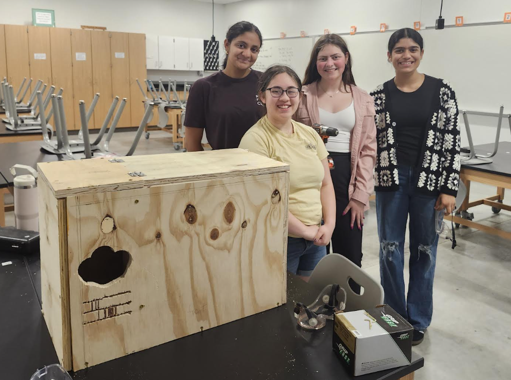 Ames High Students with barn owl habitat box