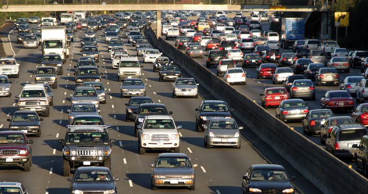 An image of vehicles on a highway