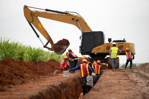 Group of worker and construction engineer wear safety uniform excavation water drainage at construction site