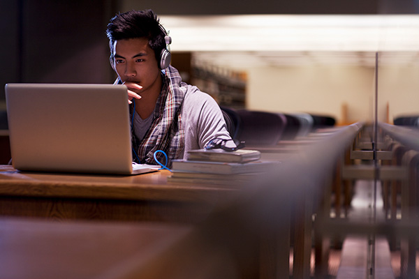 Man in front of his laptop