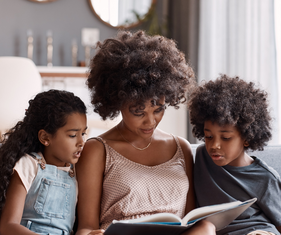 mom reading with two kids
