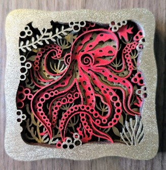 Art piece with a red octopus.