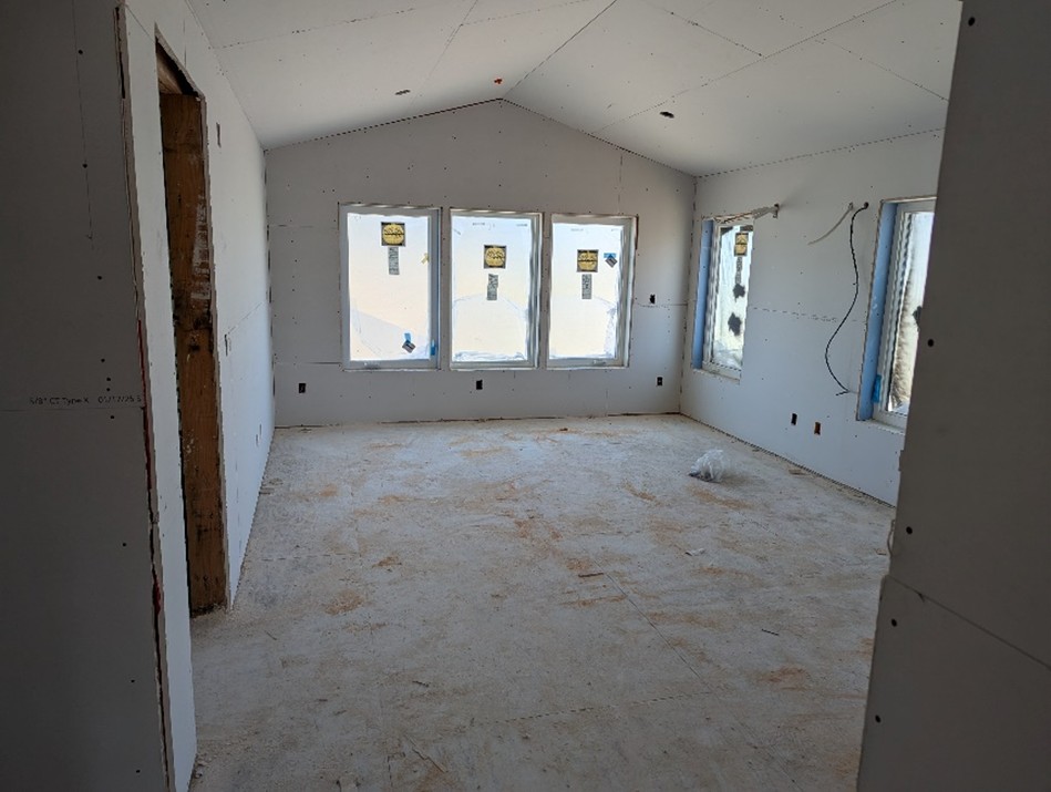 An interior view of one room of the Nordic Cottages in the process of being built.