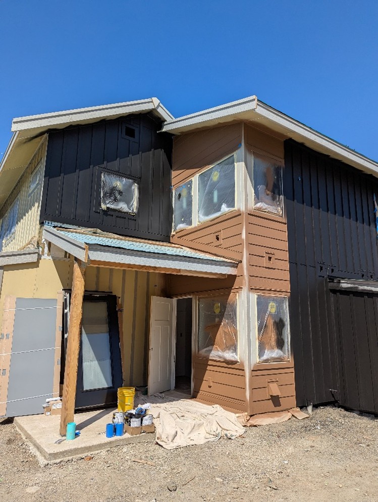 The front exterior view of the Nordic Cottages in the process of being built.