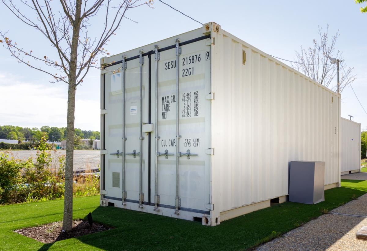 container for storing landscaping equipment