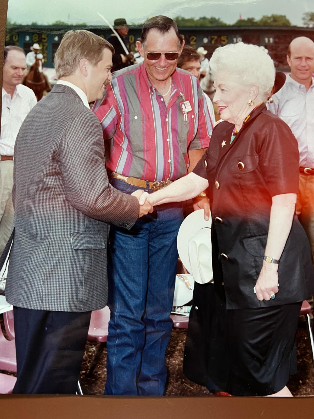 TTA Executive Director Jeff Hooper shook hands with Texas Governor Ann Richards 