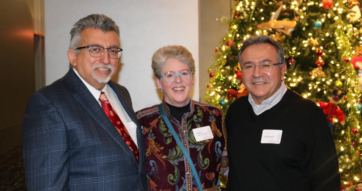 Dr Villa with donors at the Foundation Holiday Party
