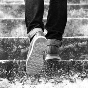 Person walking up the stairs