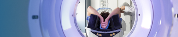 Person laying down receiving a PET/CT scan at St. Joseph's.
