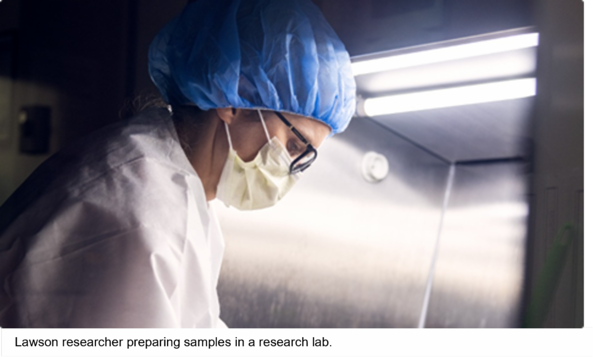 Lawson researcher preparing samples in a research lab.