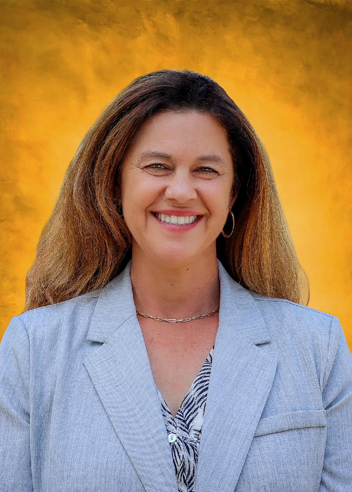 Headshot of a person smiling 