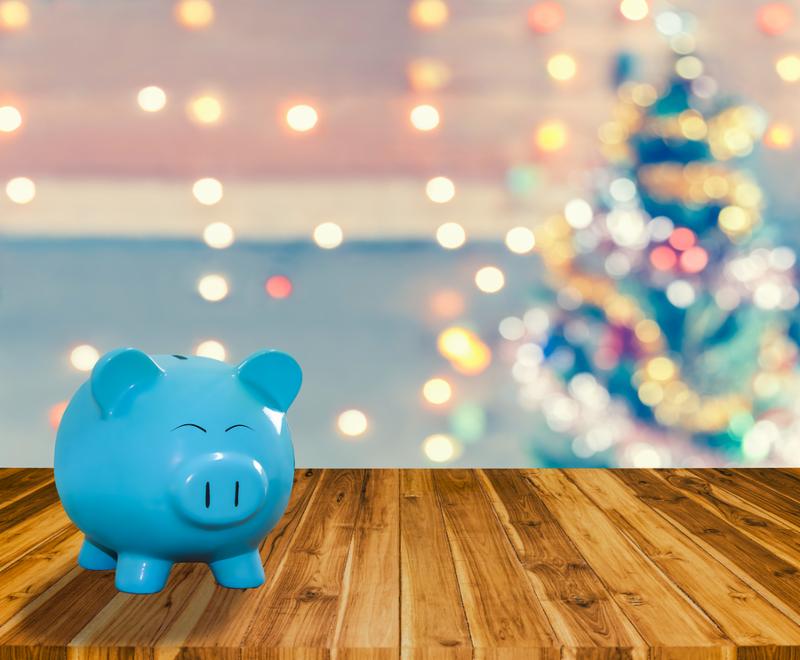 Blue pig bank on wood plank with sparkle blur Christmas tree. You can apply for blur Christmas wallpaper, blur Christmas background, blur Christmas backdrop blur and everything about Christmas celebration background and artwork design.