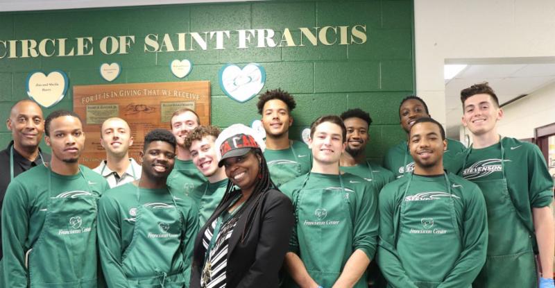 Team building at it's best.  Last Wednesday Stevenson University 's basketball team served dinner to our neighbors during our community dinner.  The team also cleaned up after the meal and made sure our dinning room was ready for the next day.    Voluntee