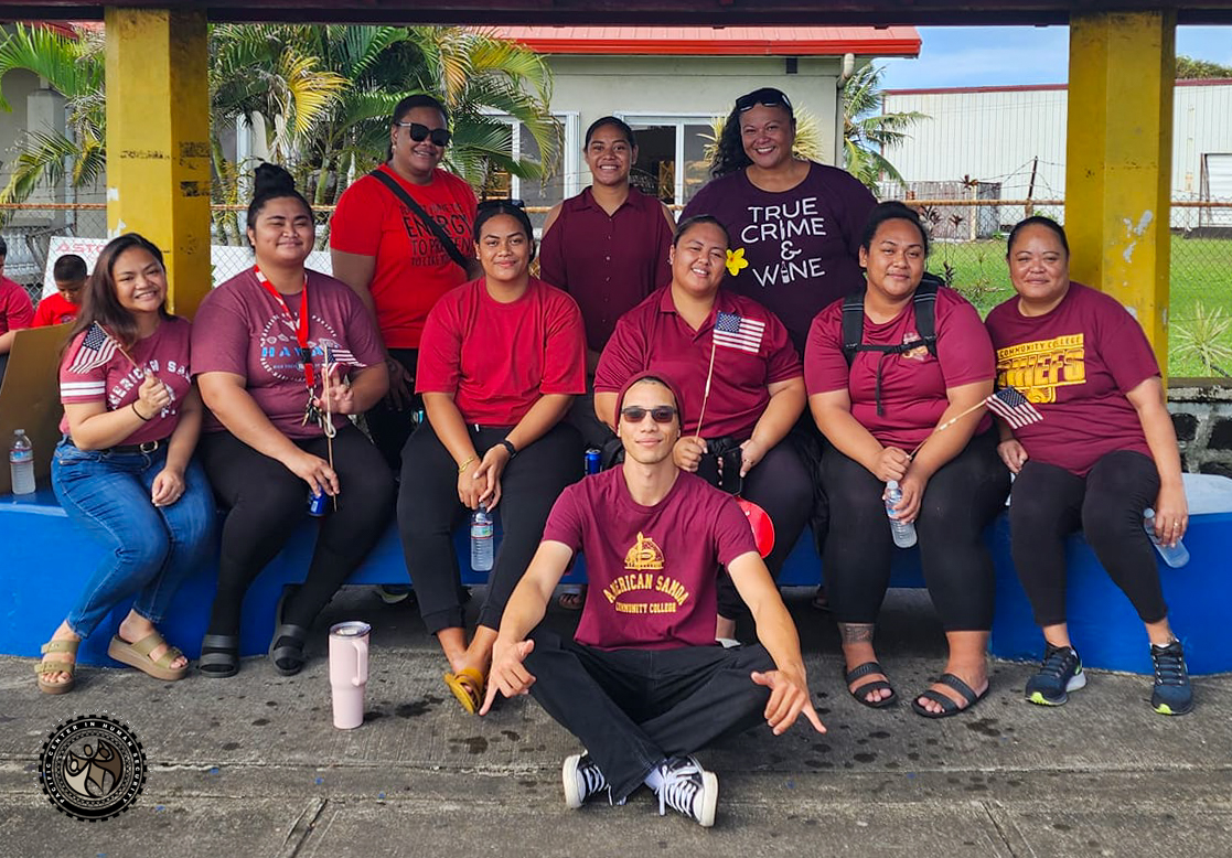 iEM students group photo at the bus stop in front of American Samoa Red Cross