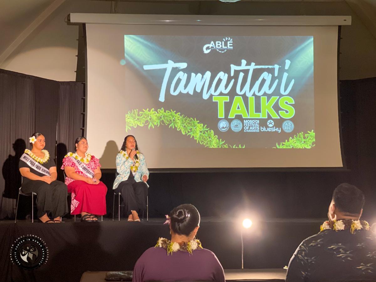 Tapuitea with two other ladies on stage answering questions about their platform.