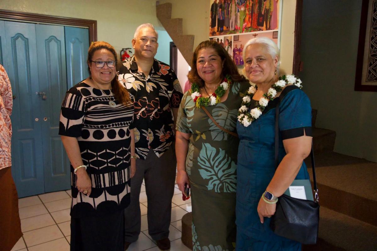 Dr. Rosevone Pato and Tafaimamao Tua-Tupuola with other attendees in the Adult Day Services lobby