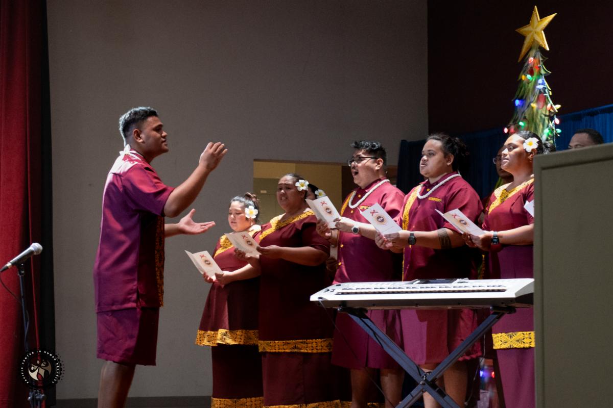 iEM trainee Leva conducting the cohort choir