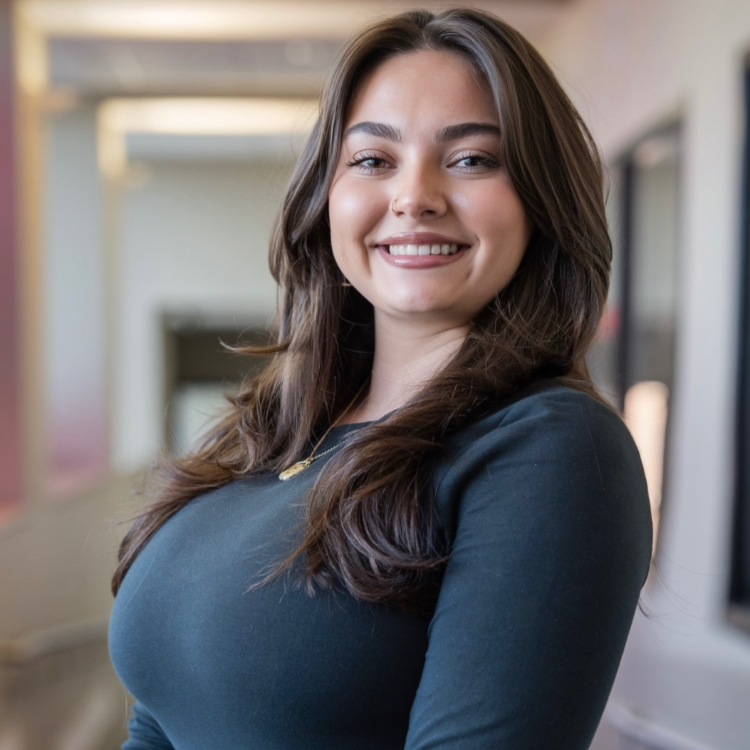 woman smiling in long hallway