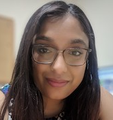 woman wearing glasses smiling