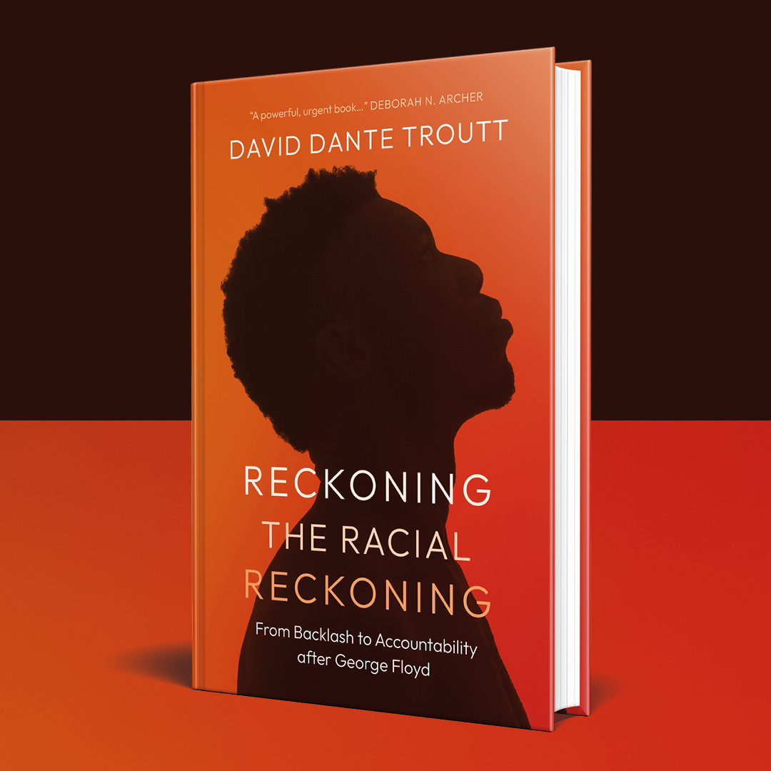 orange book with dark silhouette on the cover and text in foreground of orange and brown background