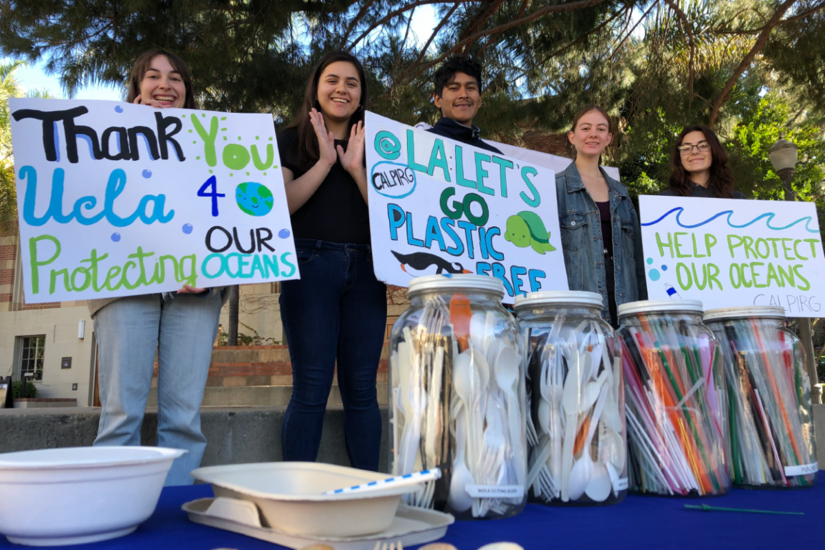 Students from UCLA’s CALPIRG chapter gather for an announcement about the university’s plans to phase out single-use plastics in food service.