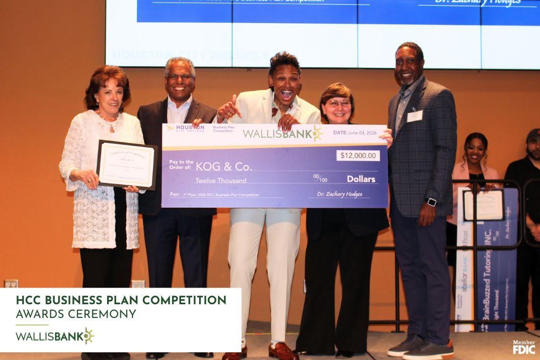 On stage - 1st Place Winner $12,000 goes to KOG & Company - Khaliah O. Guillory