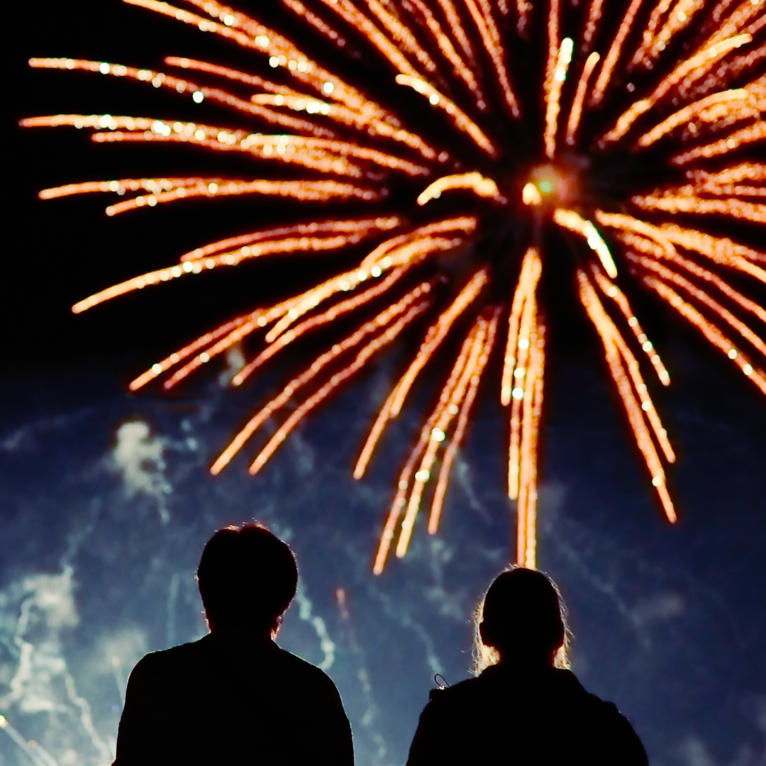 two friends watching fireworks together