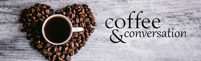 Image of coffee cup and coffee beans in a heart shape