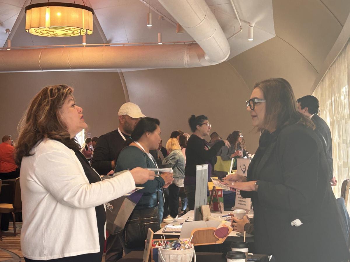 Image of staff and parent at IEP day