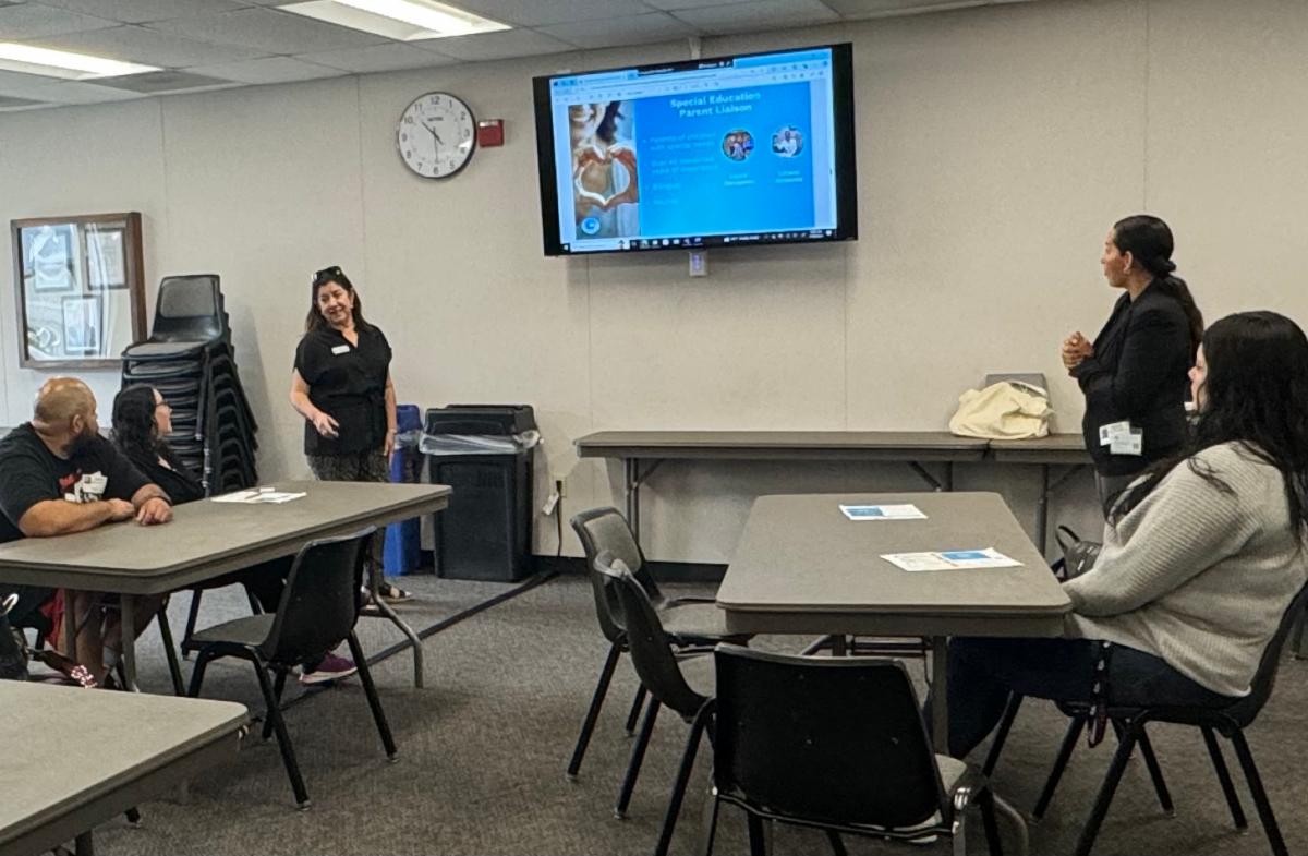SELPA staff and parents at training