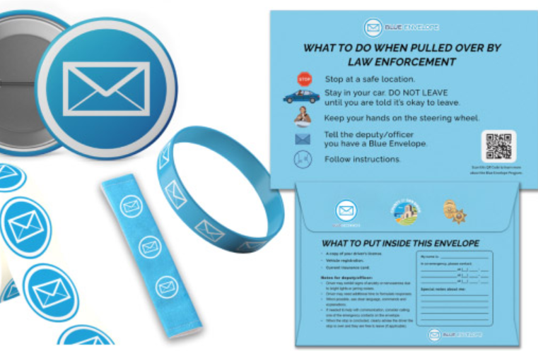 Blue Envelope Program materials including envelope pin bracelet stickers