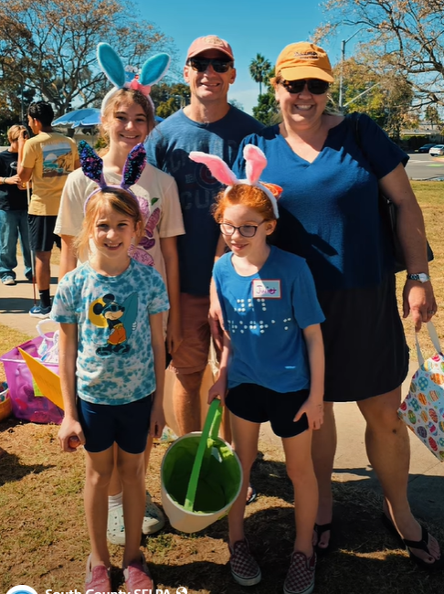 image of family at beeping egg hunt