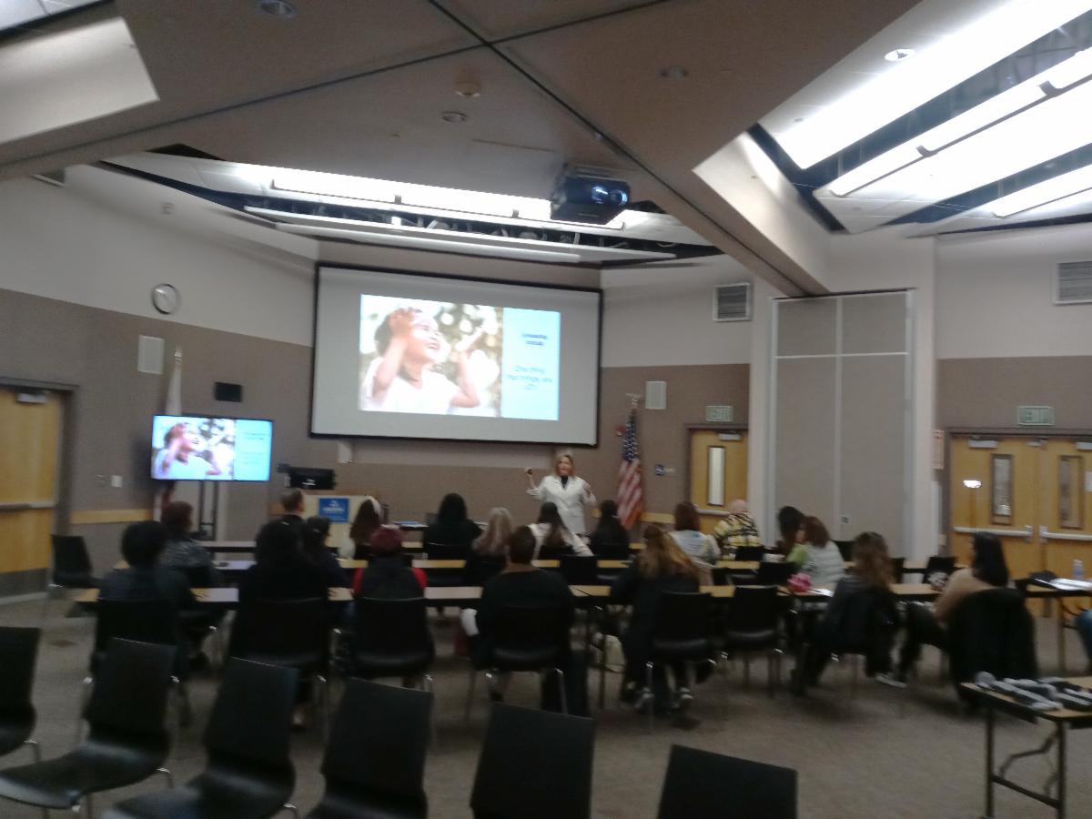 Image of presentation with participants 