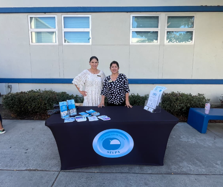 Our Parent Liaisons hosting the SC SELPA informational table