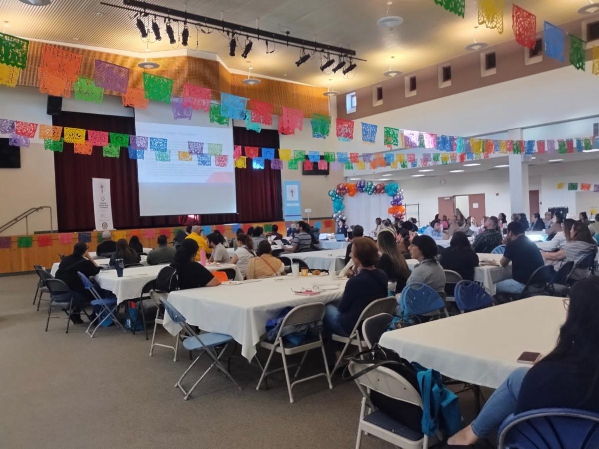 FERIA Conference presentation inside auditorium full of parents and families