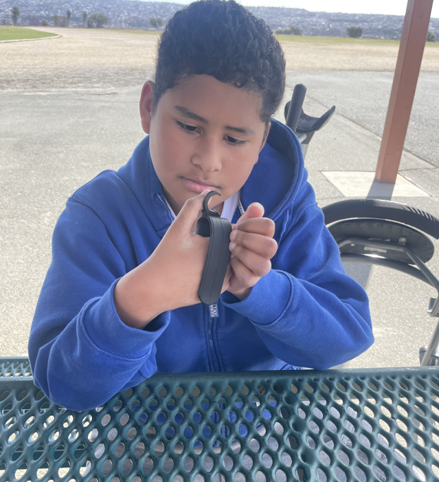 Image of student with assistive technology device